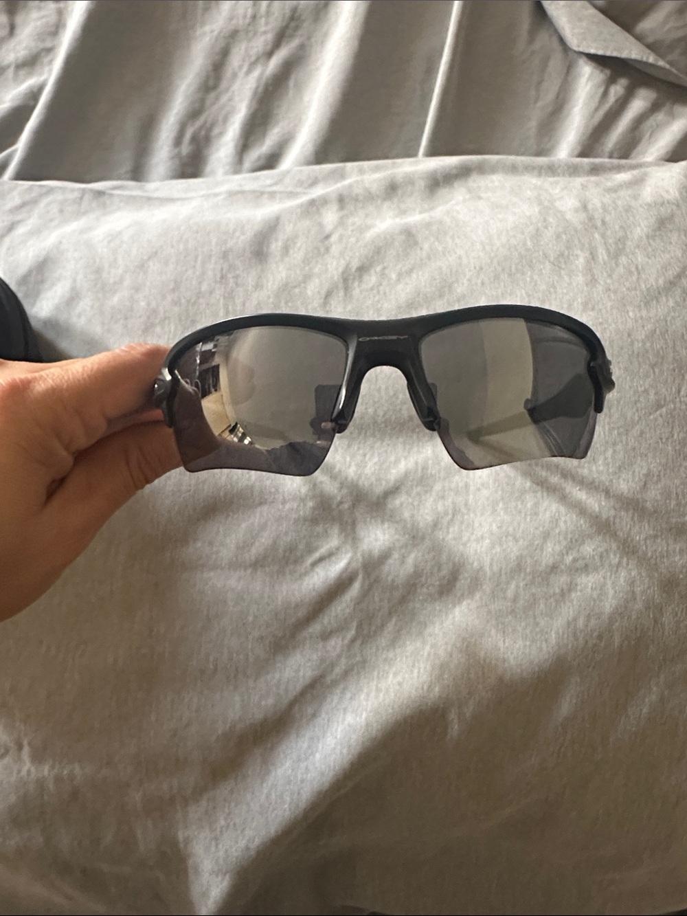 Oakley Black Frame Sunglasses with Gray Smoke Lenses